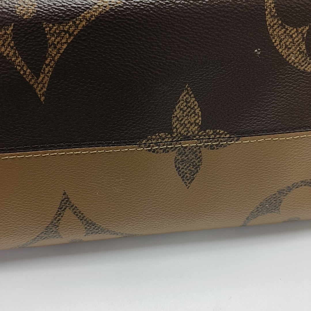 ONTHEGO MM Monogram Coated Canvas Brown