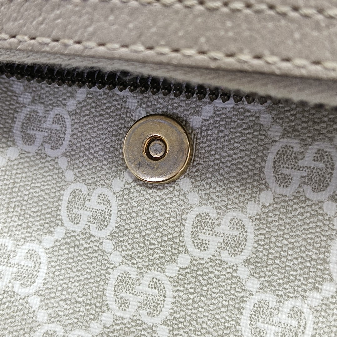 Monogram Coated Canvas Backpack Beige