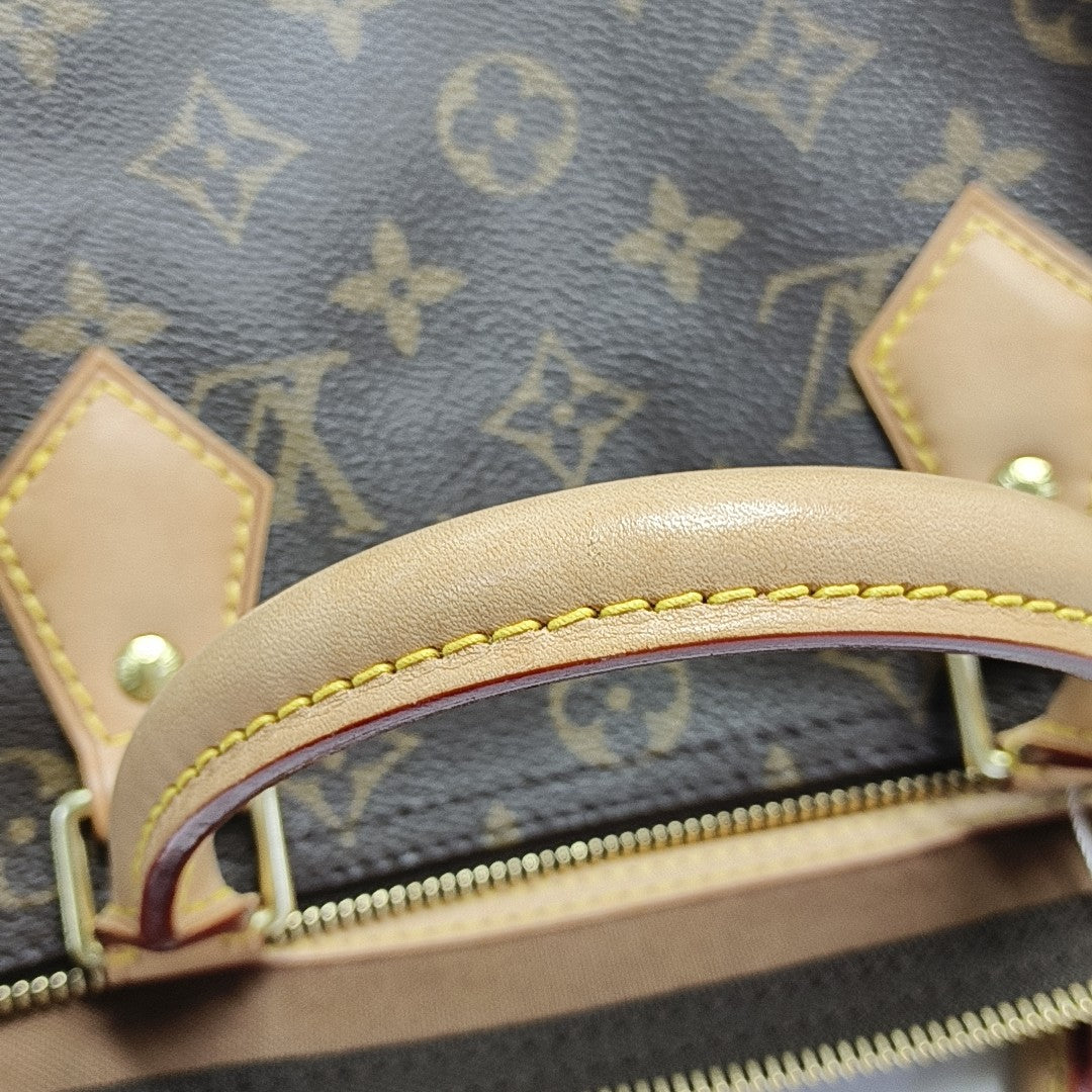 SPEEDY 30 Monogram Coated Canvas Brown
