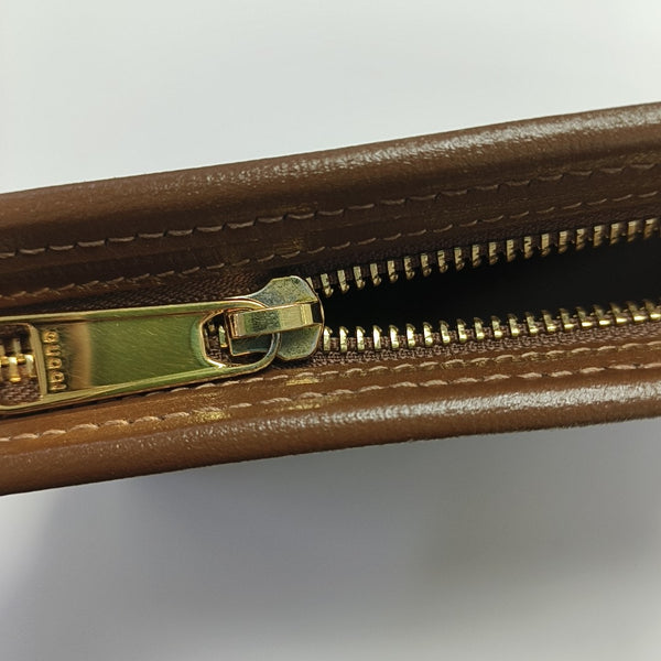 Monogram Coated Canvas Clutch Beige