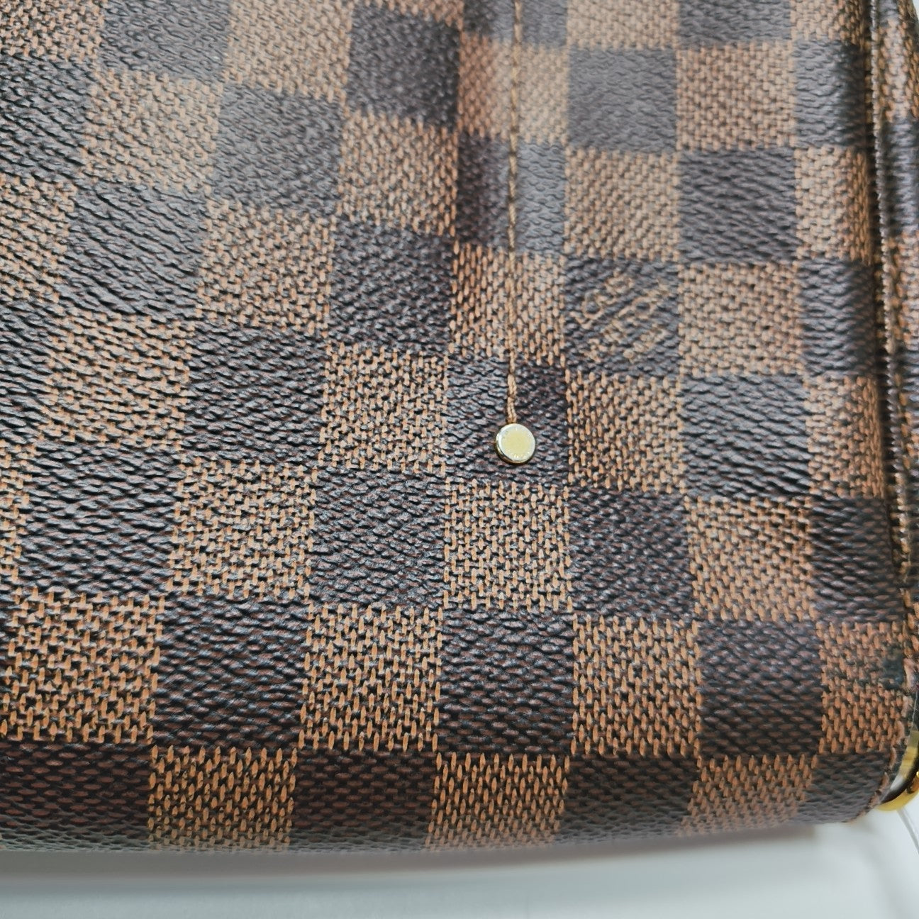 FAVORITE MM Damier Ebene Coated Canvas Brown