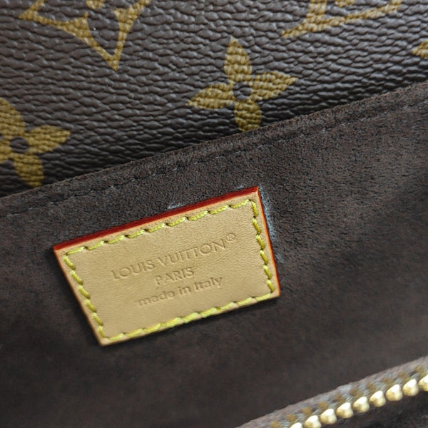 MÉTIS EAST WEST Monogram Coated Canvas Brown