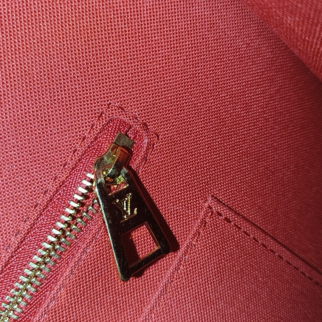 ONTHEGO MM Monogram Coated Canvas Brown