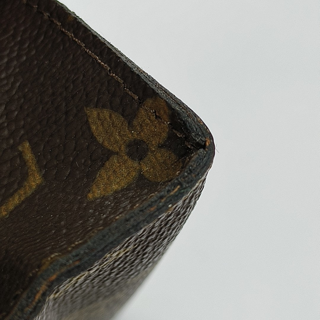 TOILET POCKET Monogram Coated Canvas Brown