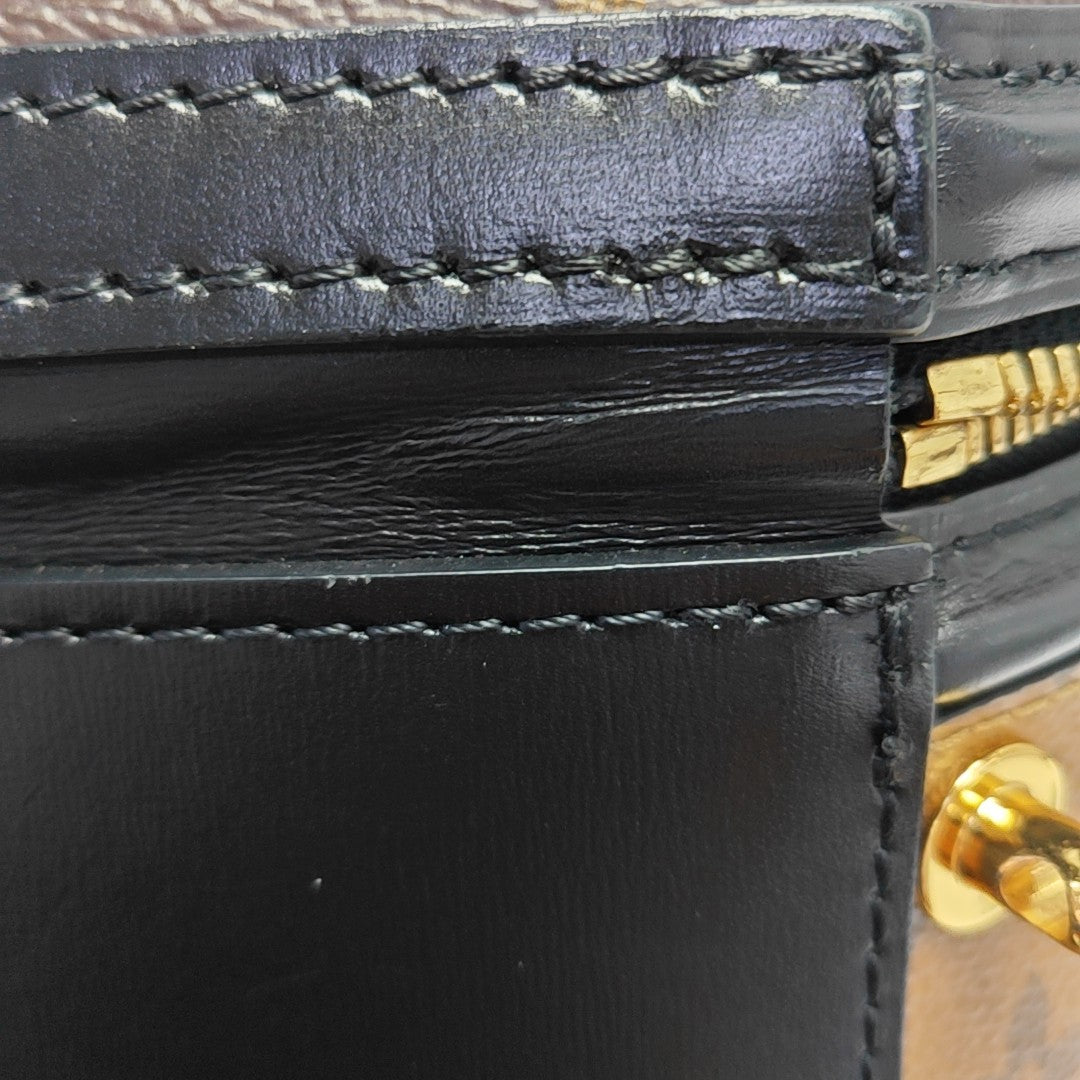 CANNES PM Monogram Coated Canvas Brown