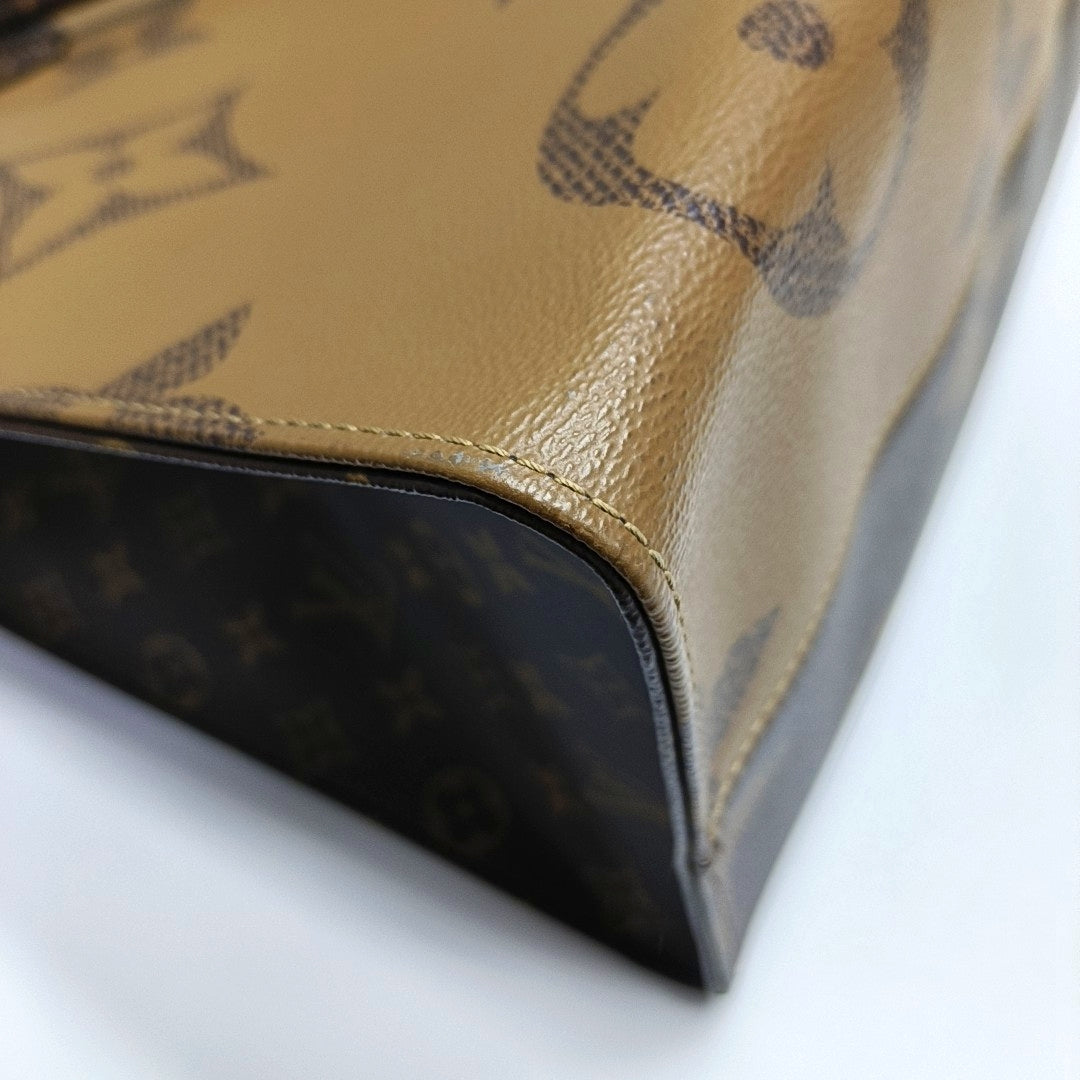 ONTHEGO GM Monogram Coated Canvas Brown