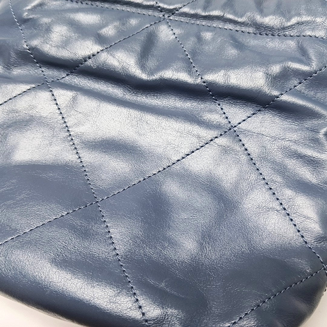 Authenticated pre-owned  CHANEL 22 Mini Quilted Calfskin Blue - Bucket Bag at Looply