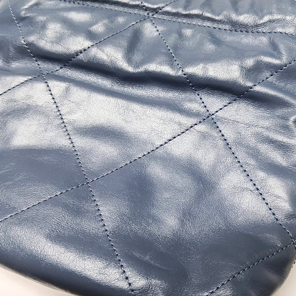 Authenticated pre-owned  CHANEL 22 Mini Quilted Calfskin Blue - Bucket Bag at Looply