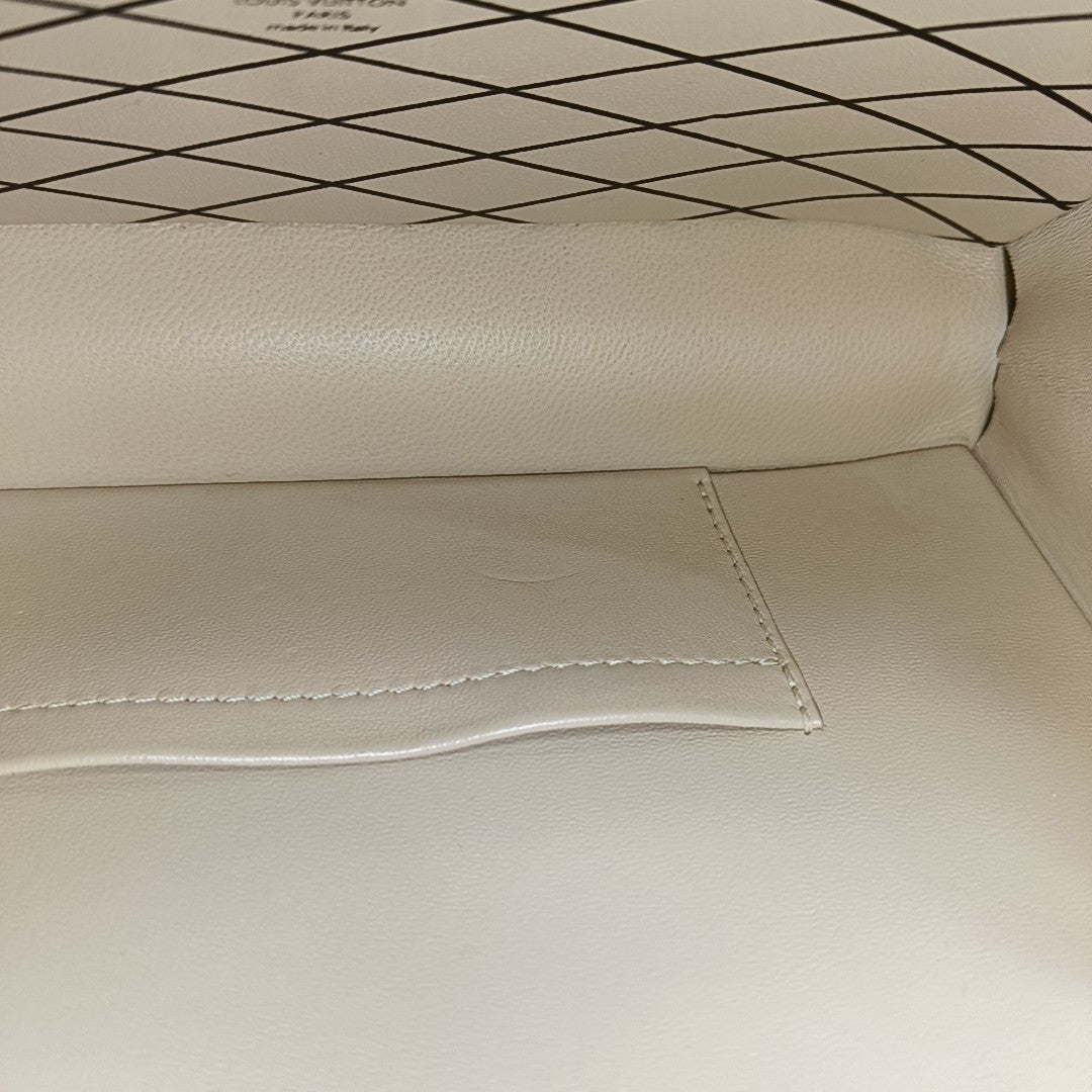 PETITE MALLE Monogram Coated Canvas Brown