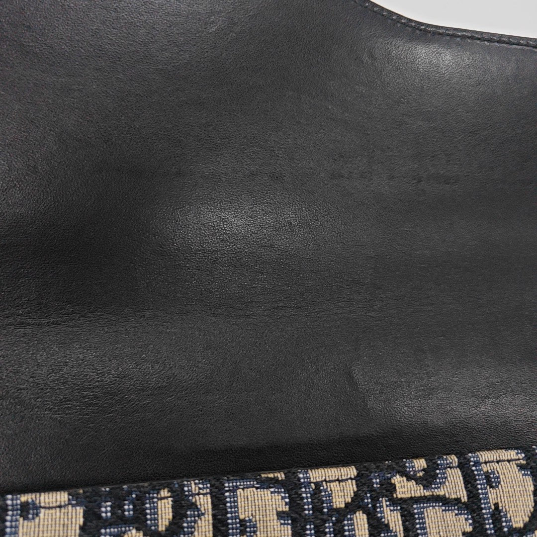 Oblique Canvas Clutch Blue
