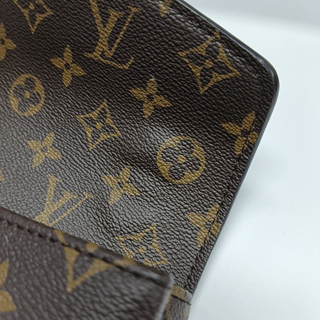 MÉTIS EAST WEST Monogram Coated Canvas Brown