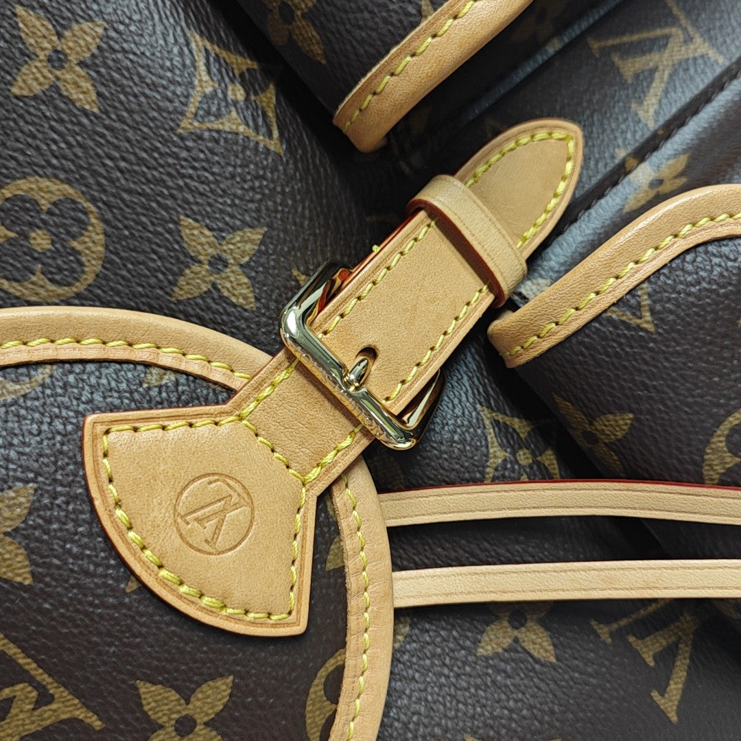EXCURSION PM Monogram Coated Canvas Brown
