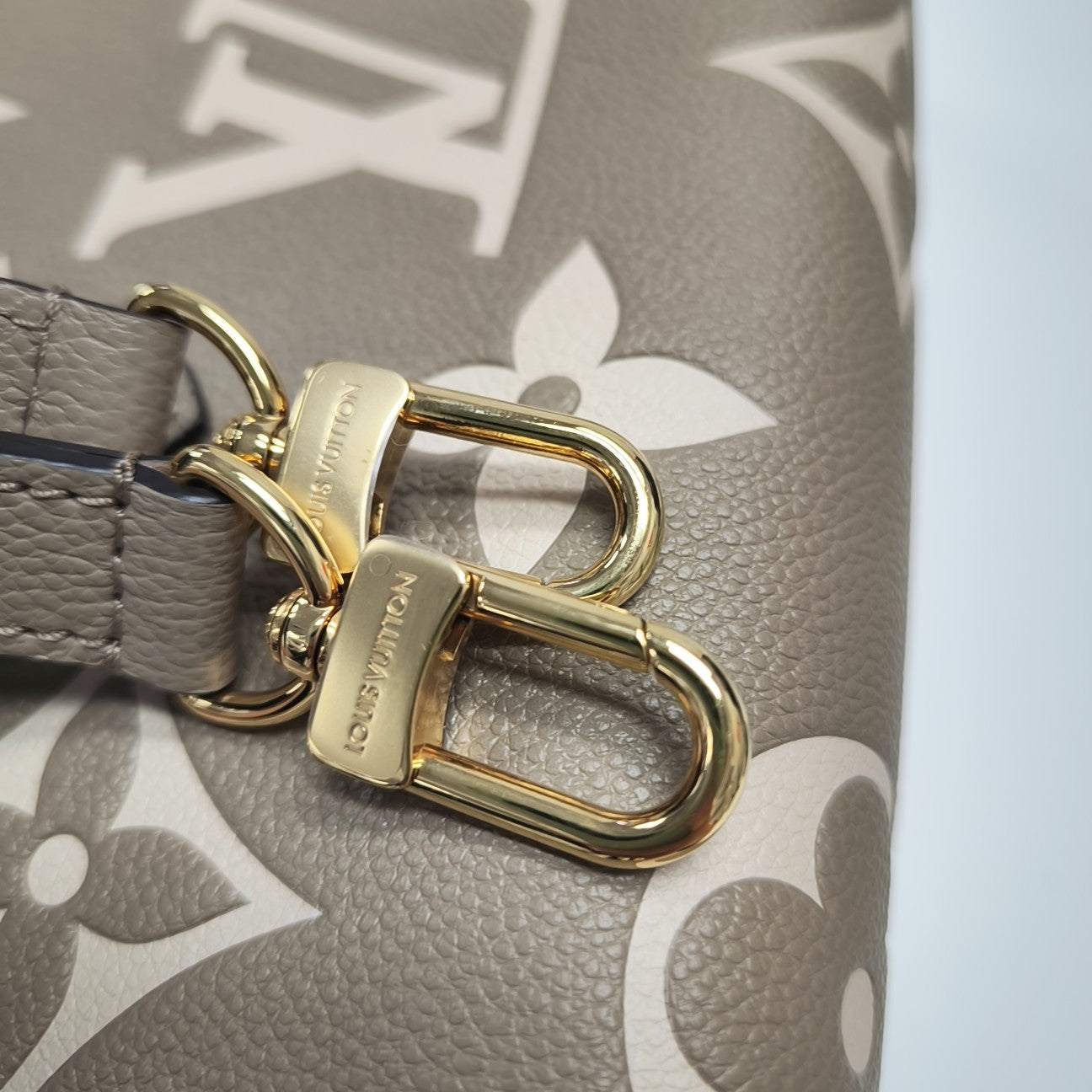 ONTHEGO EAST WEST PM Monogram Calfskin Gray