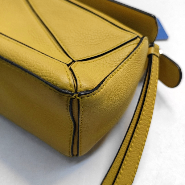 Authenticated pre-owned  Puzzle Mini Calfskin Yellow - Crossbody Bag at Looply