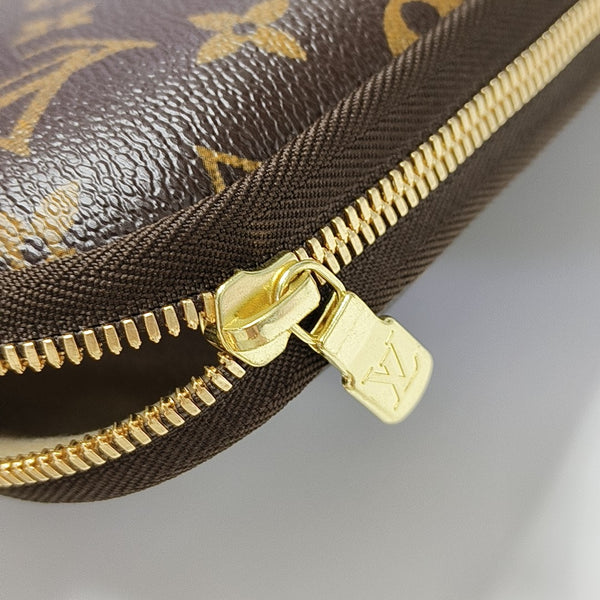 SLEEVE Monogram Coated Canvas Brown