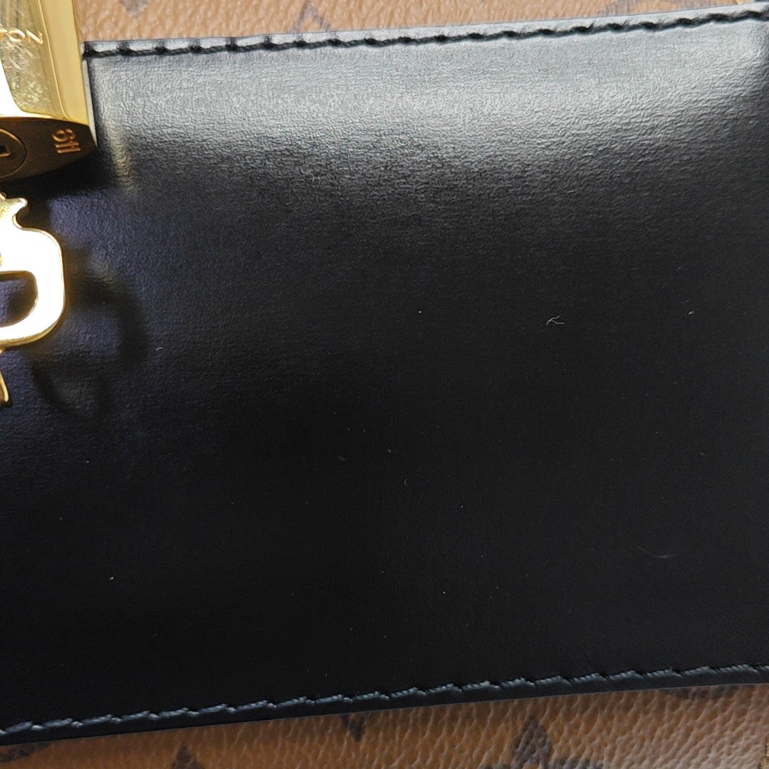 CANNES PM Monogram Coated Canvas Brown