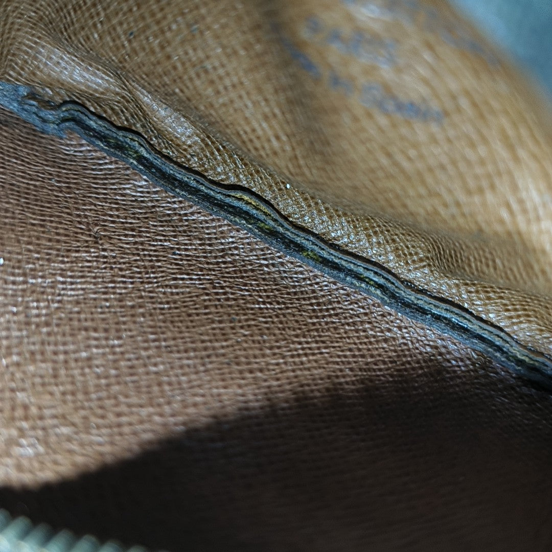 Monogram Coated Canvas Clutch Brown