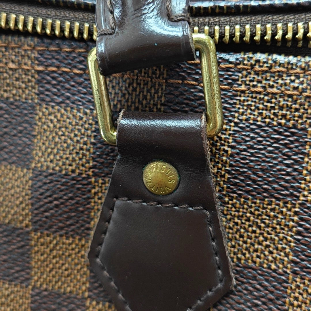 Authenticated pre-owned  SPEEDY 30 Damier Ebene Coated Canvas Brown - Top Handle Bag at Looply