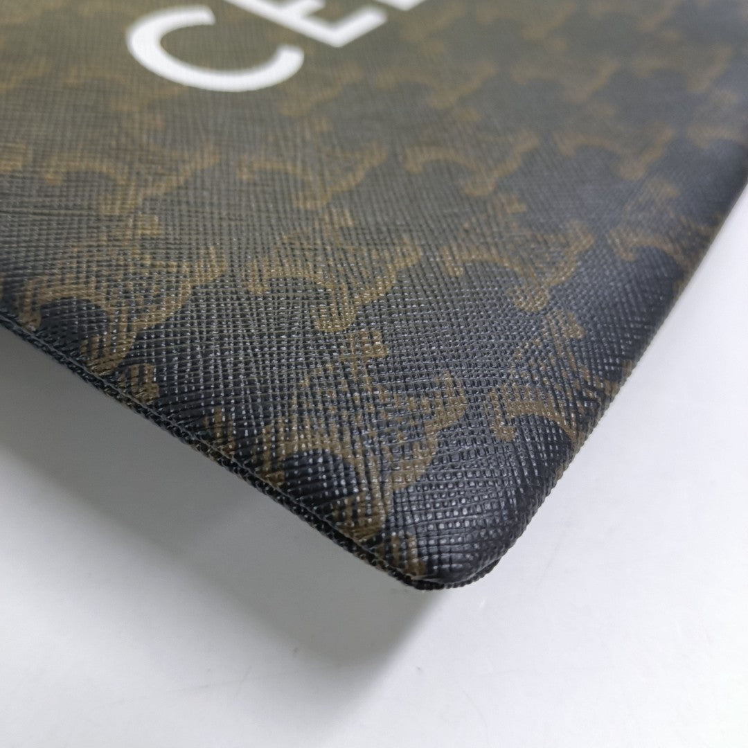 Authenticated pre-owned  TRIOMPHE Small Coated Canvas Brown - Clutch at Looply