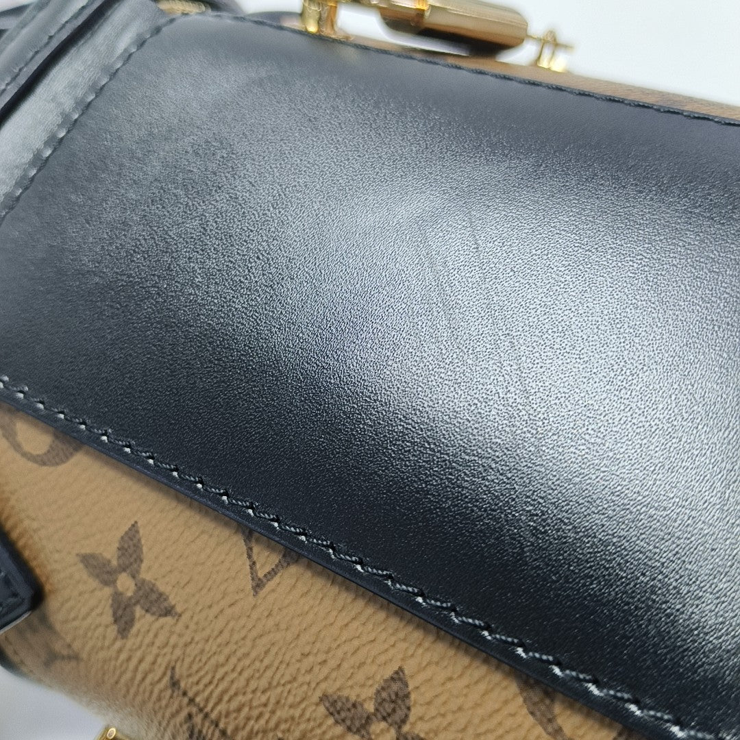 CANNES PM Monogram Coated Canvas Brown