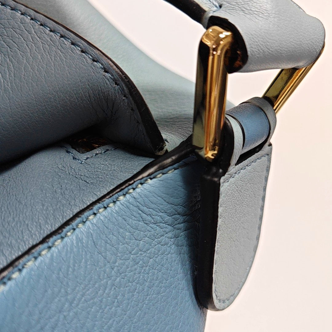 Authenticated pre-owned  Puzzle Medium Calfskin Blue - Shoulder Bag at Looply
