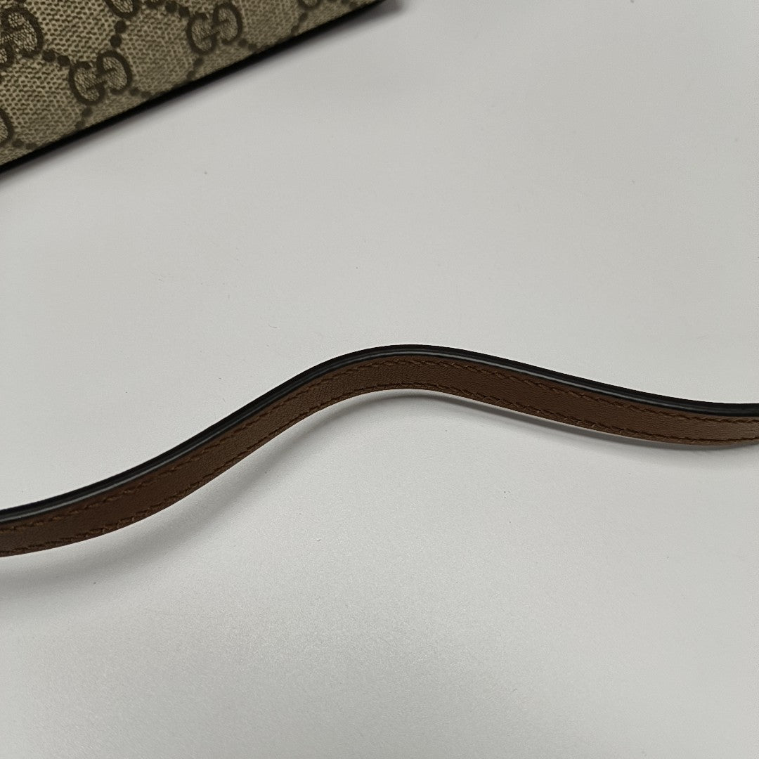 GG Emblem Monogram Coated Canvas Brown