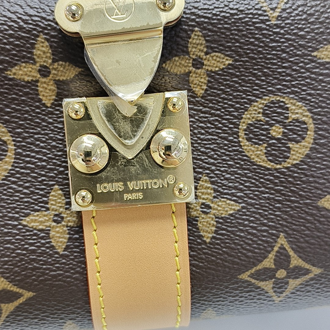 Pochette Mia Monogram Coated Canvas Brown