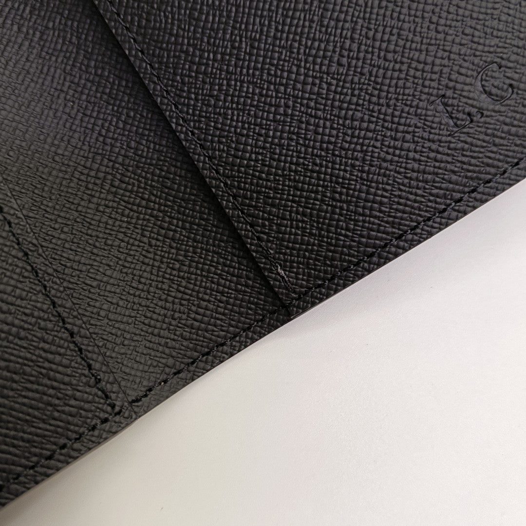 Monogram Coated Canvas Clutch Gray