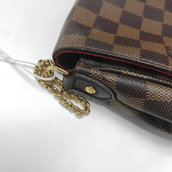 FAVORITE PM Damier Ebene Coated Canvas Brown