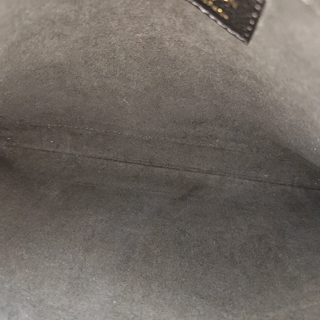 DAILY Monogram Coated Canvas Brown