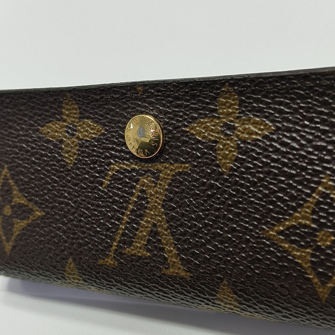 Monogram Coated Canvas Clutch Brown