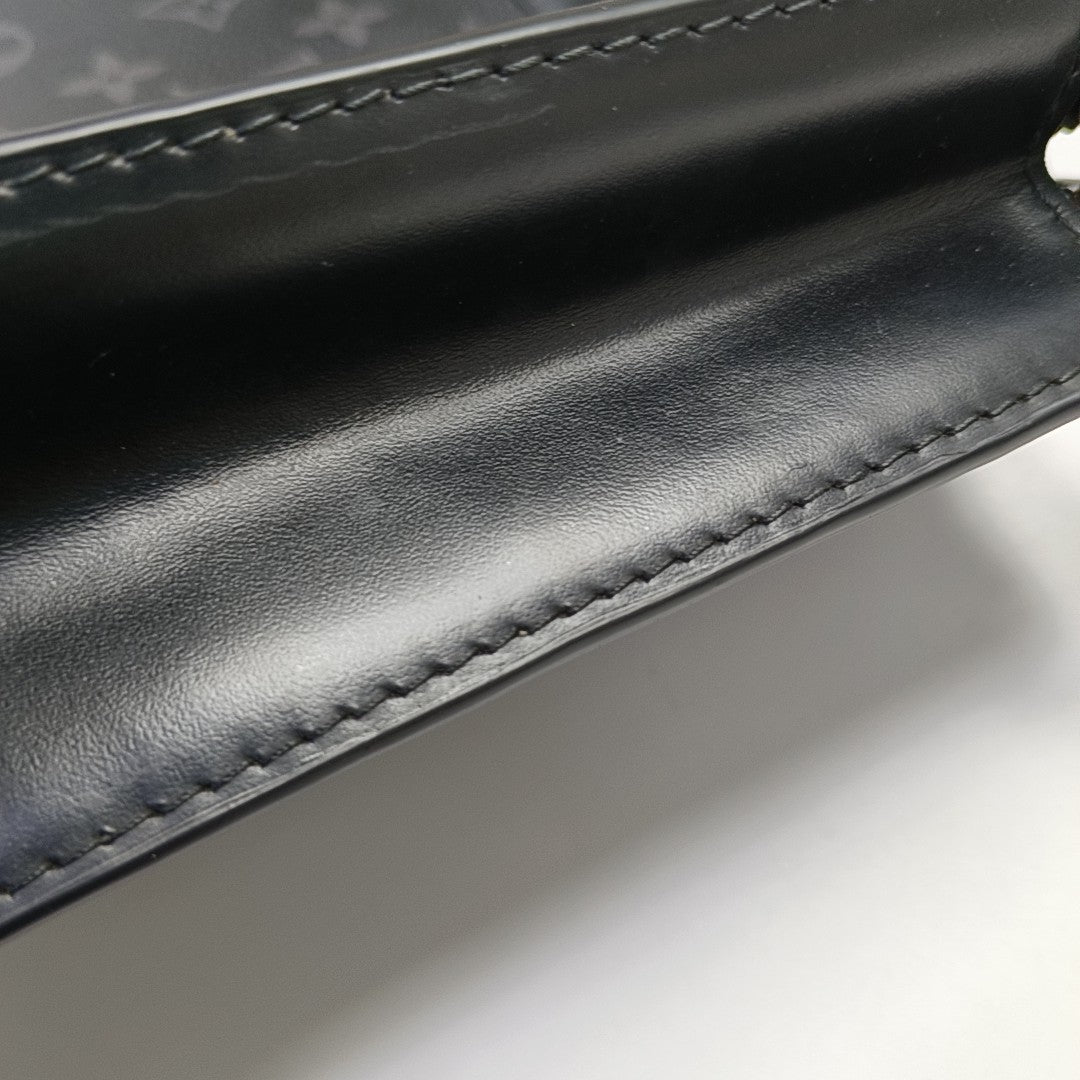 Pochette Voyag MM Monogram Coated Canvas Black