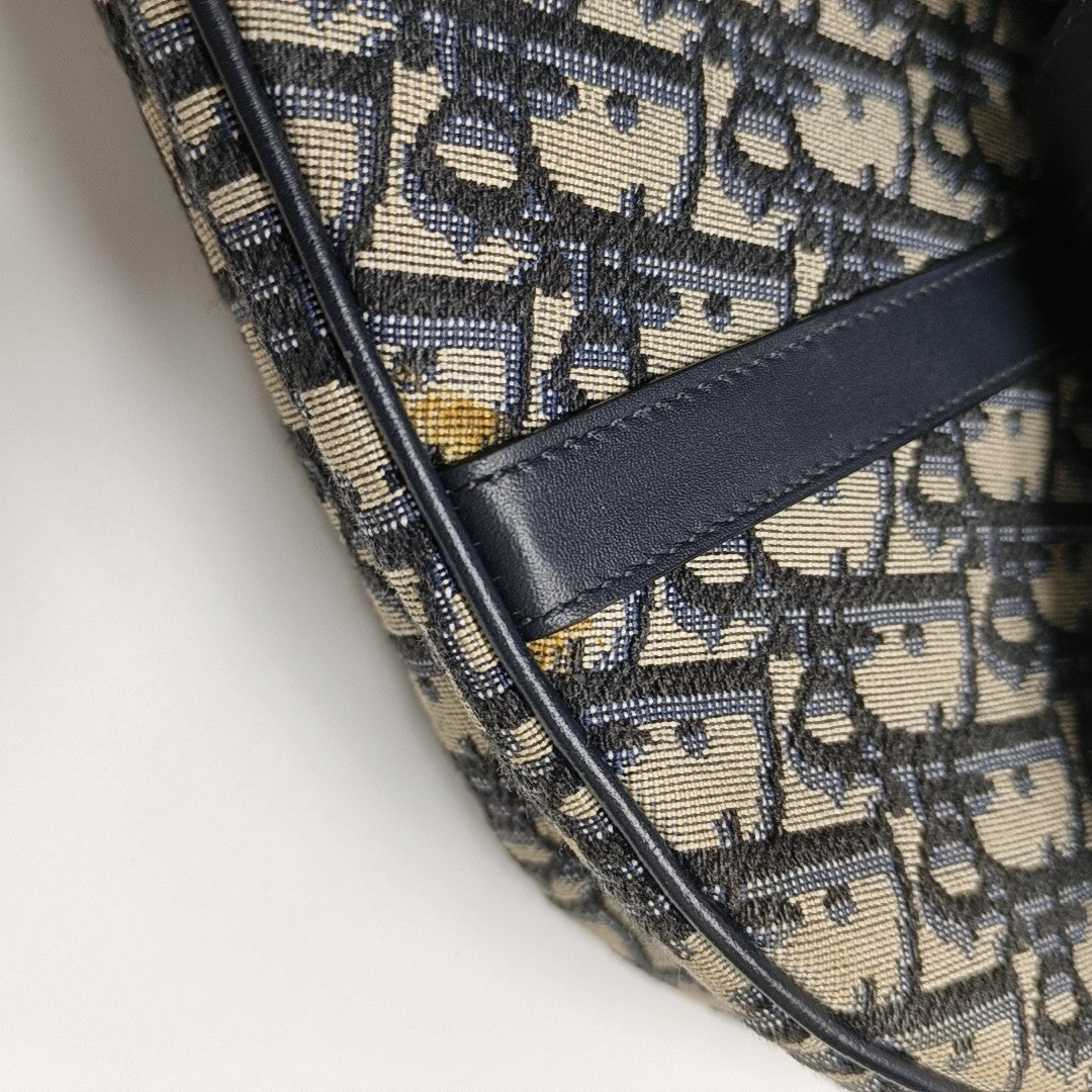 Authenticated pre-owned  Saddle Medium Oblique Canvas Blue - Top Handle Bag at Looply