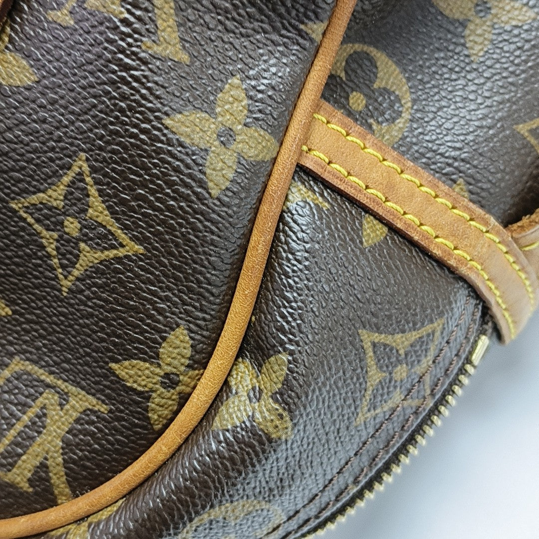 MONTORGUEI PM Monogram Coated Canvas Brown