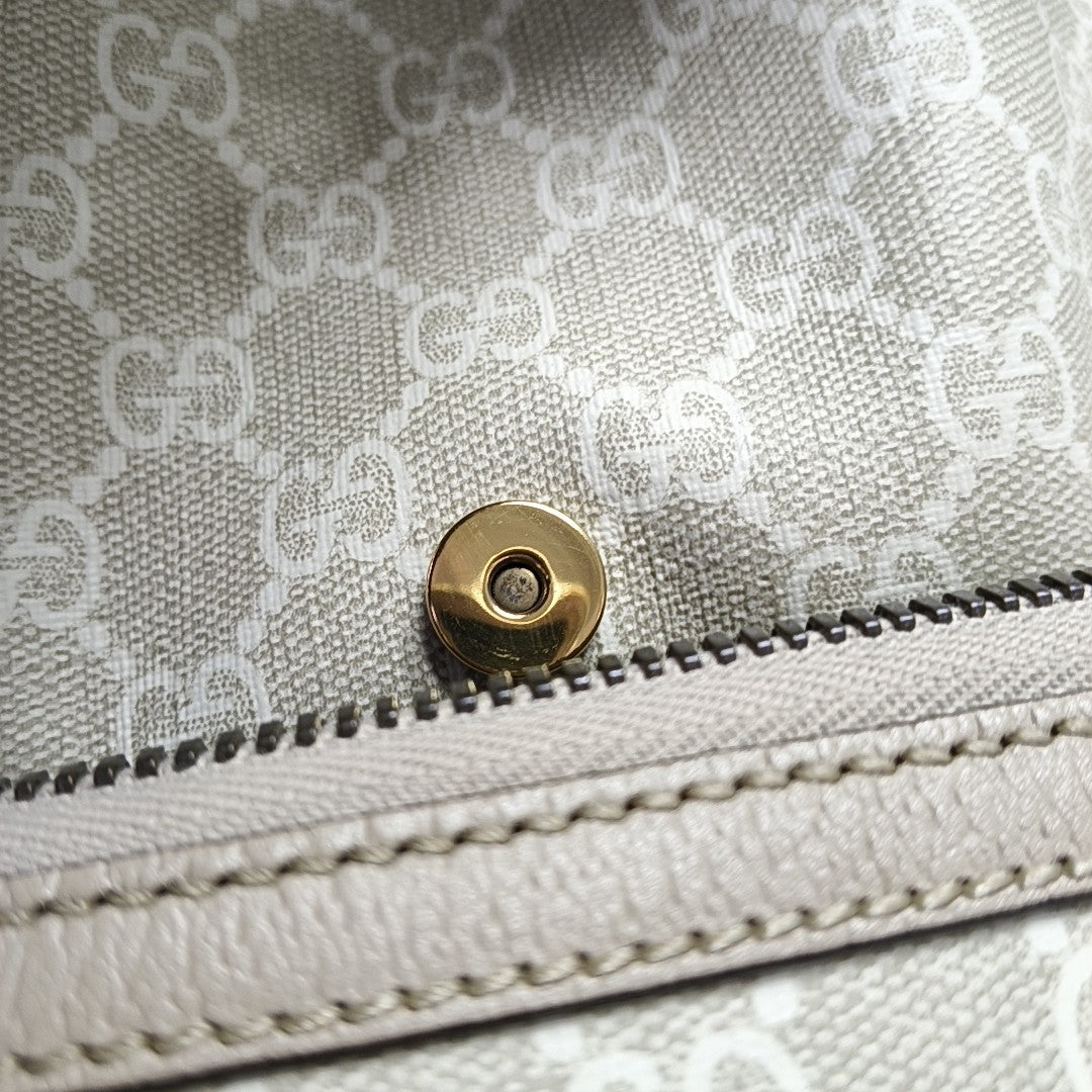Monogram Coated Canvas Backpack Beige