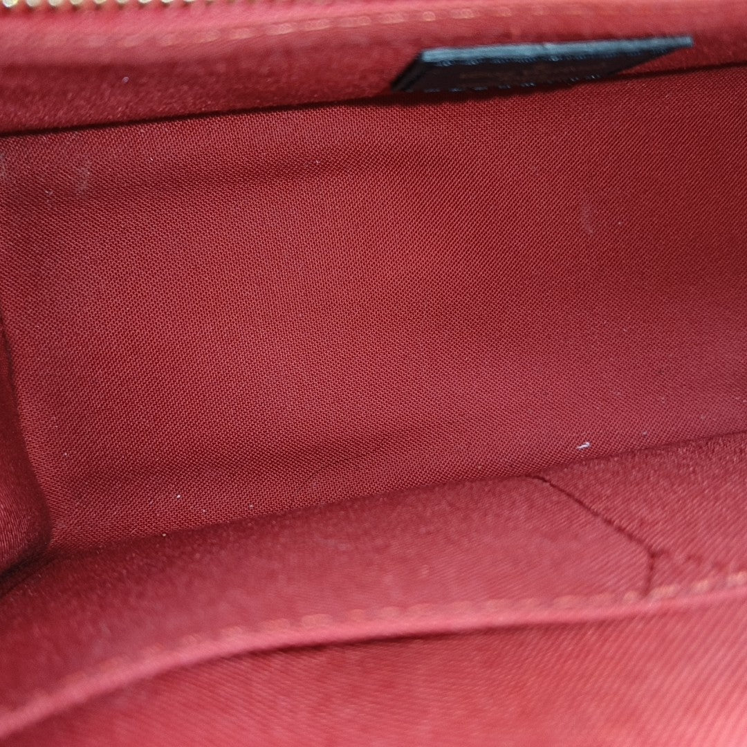 ONTHEGO PM Monogram Coated Canvas Brown