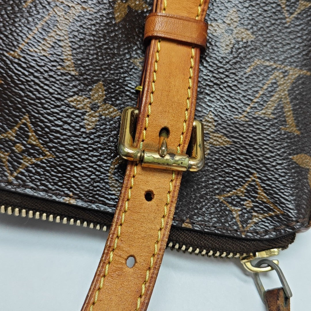 TUILERIES Monogram Coated Canvas Brown