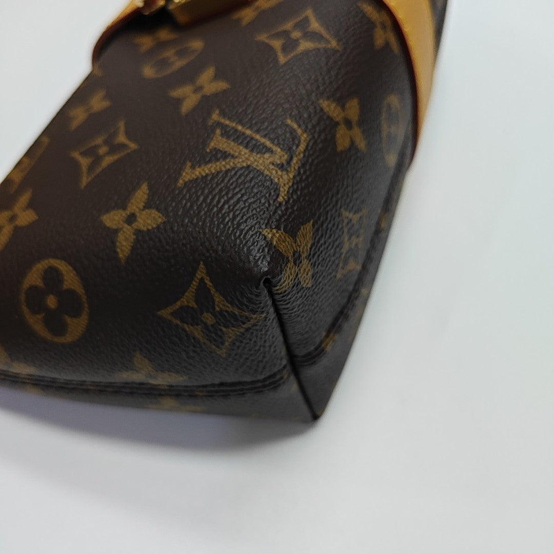 Pochette Mia Monogram Coated Canvas Brown