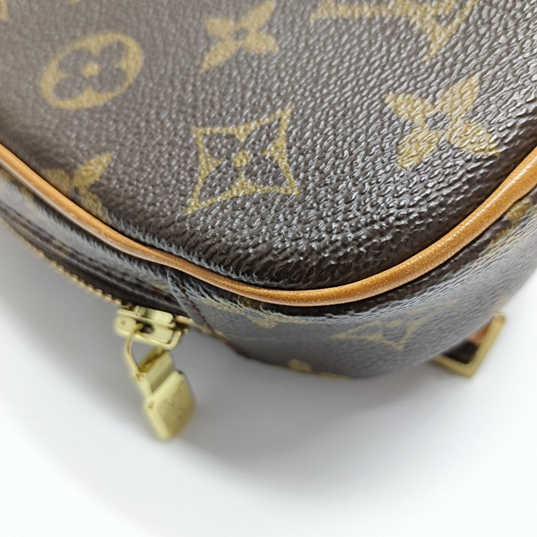 GANGE Monogram Coated Canvas Brown