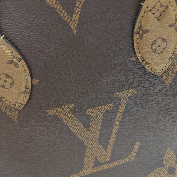 ONTHEGO MM Monogram Coated Canvas Brown