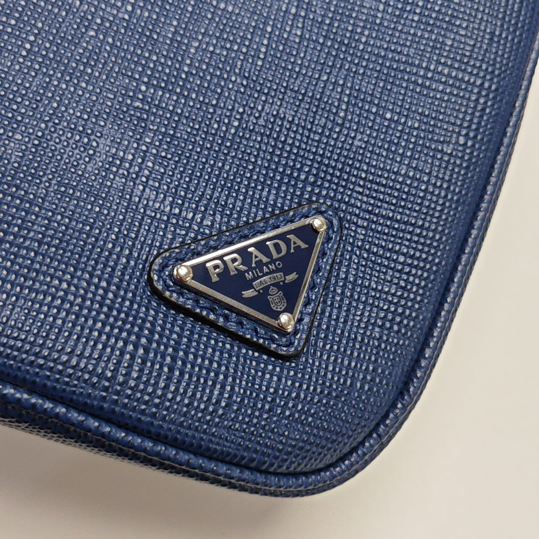 Authenticated pre-owned  Triangle Small Leather Blue - Clutch at Looply