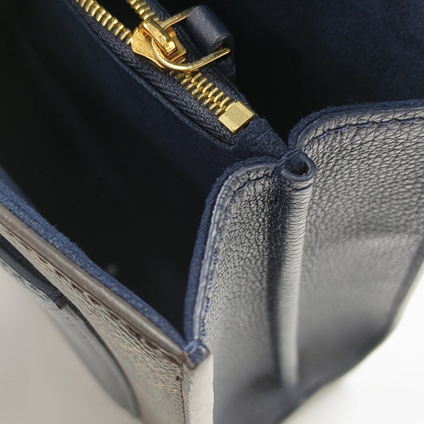 VICTOIRE Monogram Coated Canvas Brown
