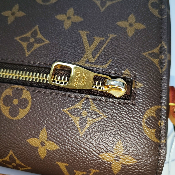 MÉTIS MM Monogram Coated Canvas Brown