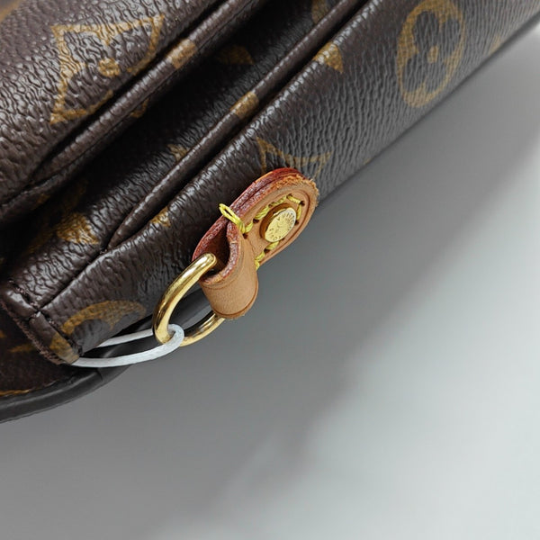 MÉTIS MM Monogram Coated Canvas Brown