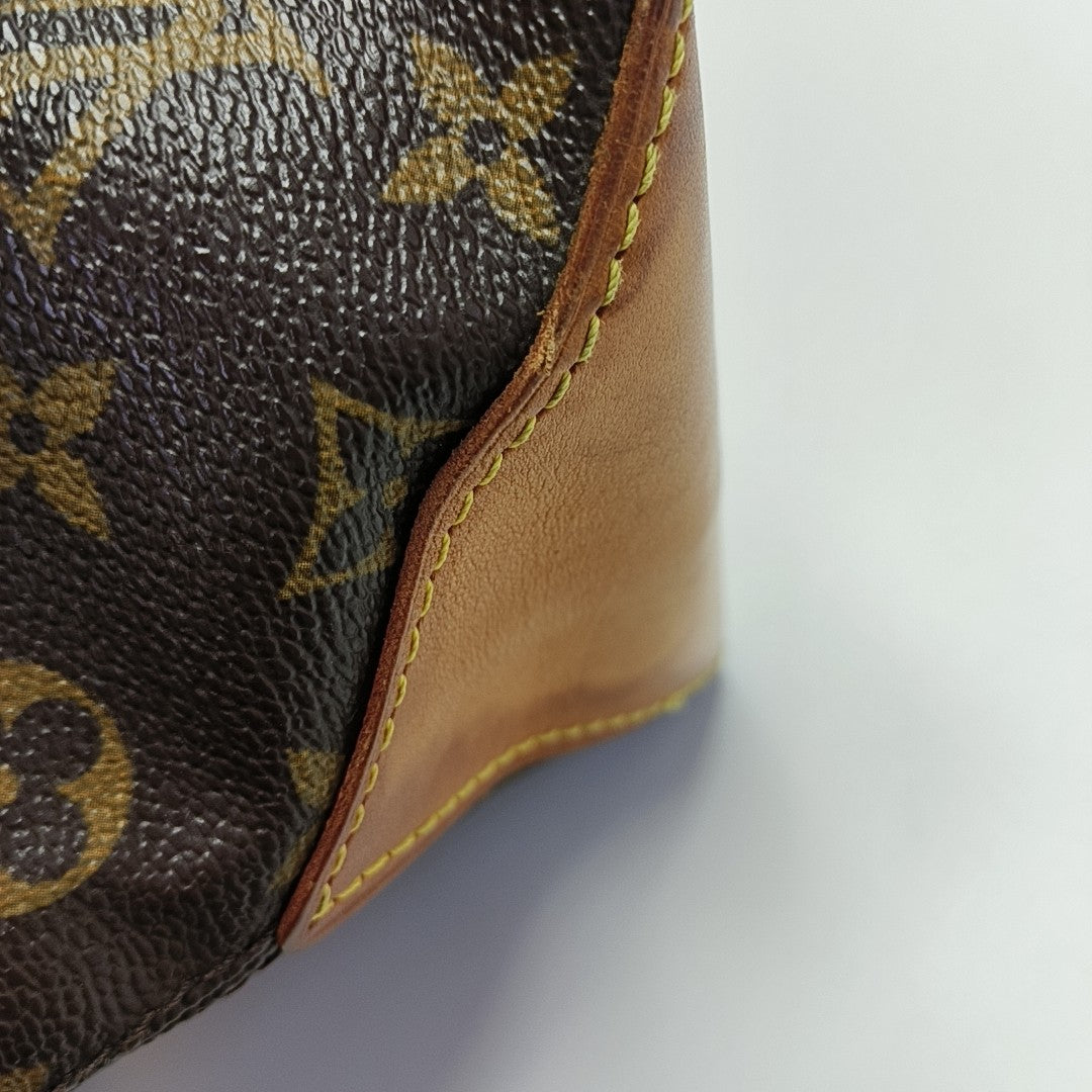 PIANO Monogram Coated Canvas Brown