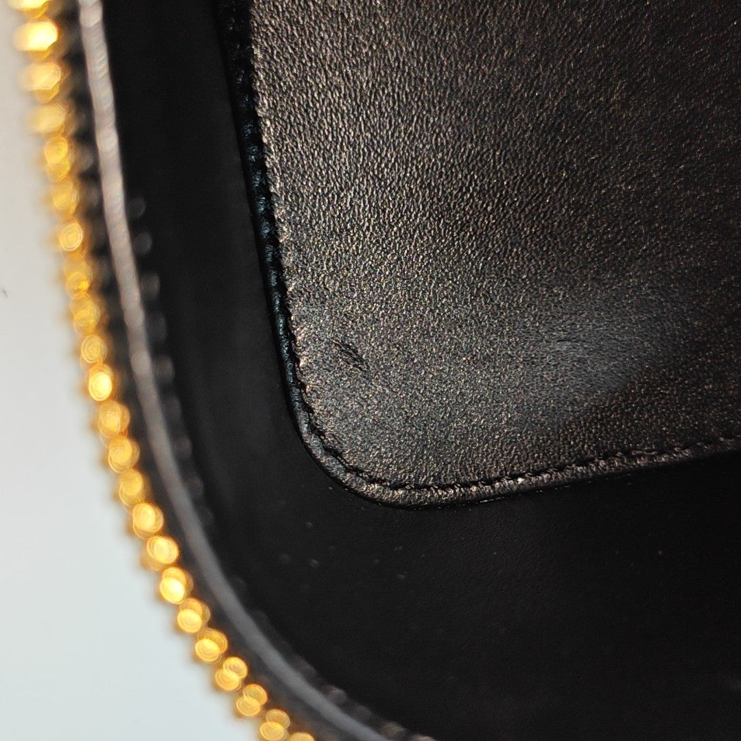 Authenticated pre-owned  TRIOMPHE Patent Leather Black - Bucket Bag at Looply
