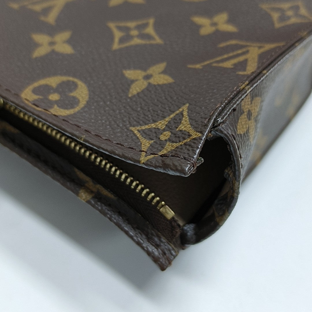 TOILET POCKET 19 Monogram Coated Canvas Brown