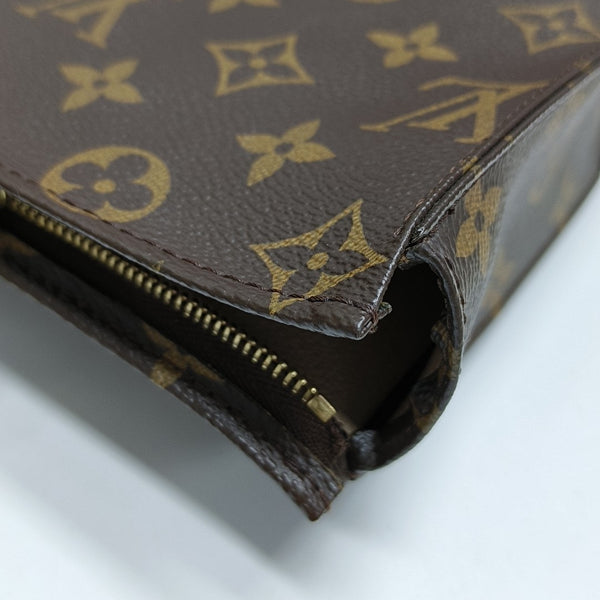 TOILET POCKET 19 Monogram Coated Canvas Brown