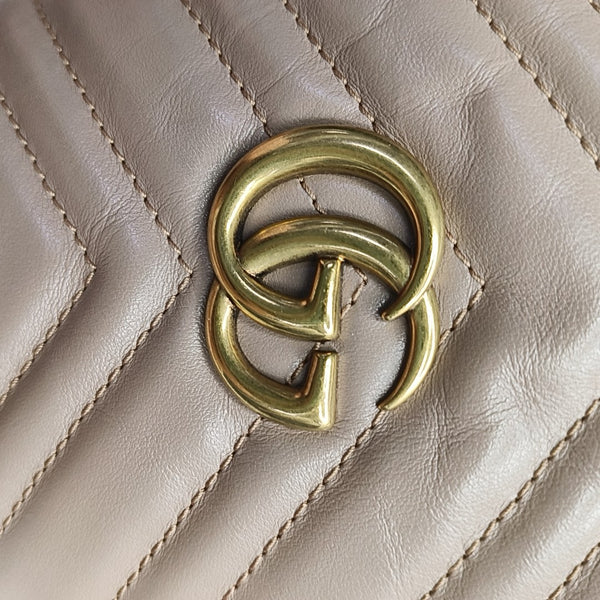 Authenticated pre-owned  GG Marmont Mini Quilted Calfskin Beige - Bucket Bag at Looply