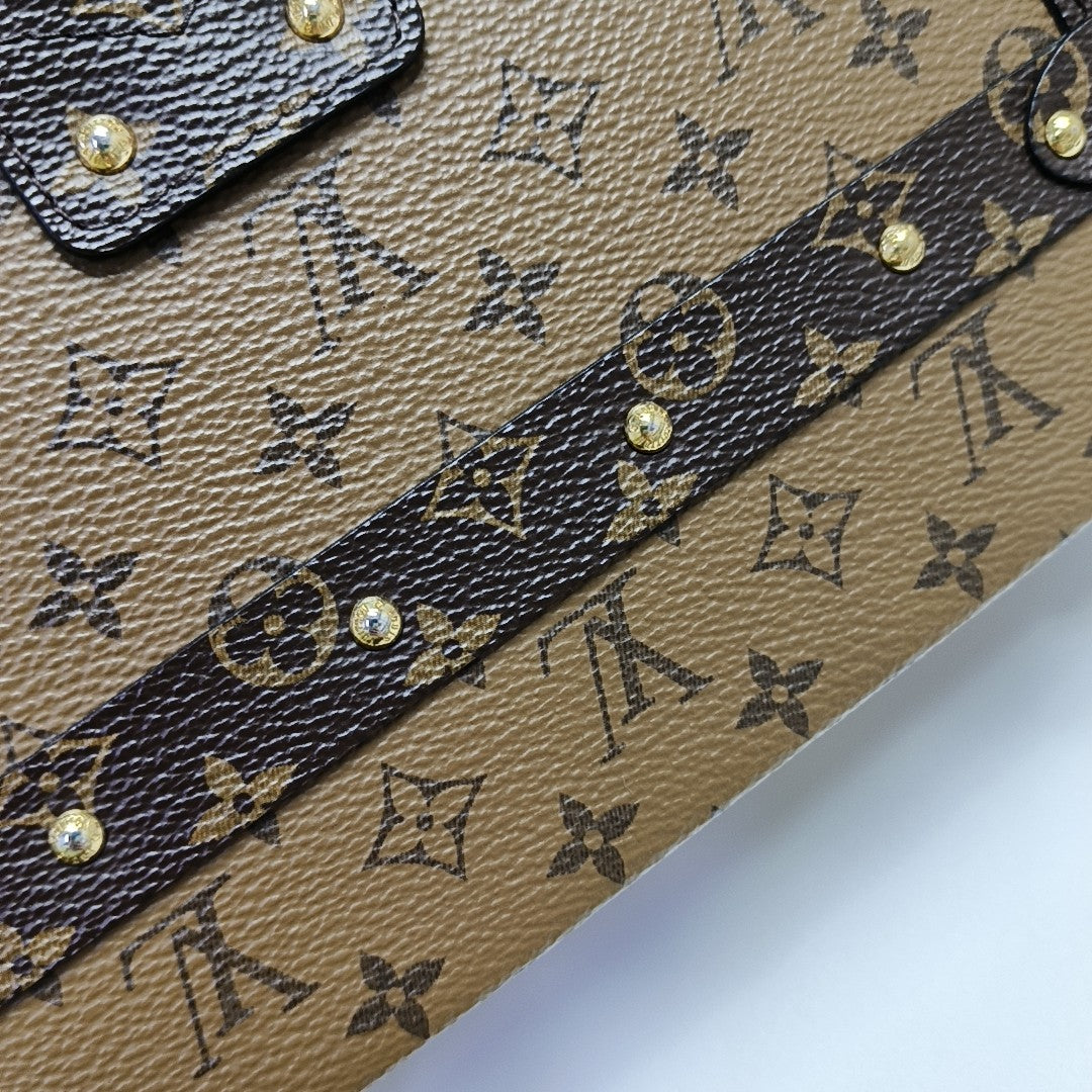 PETITE MALLE Monogram Coated Canvas Brown